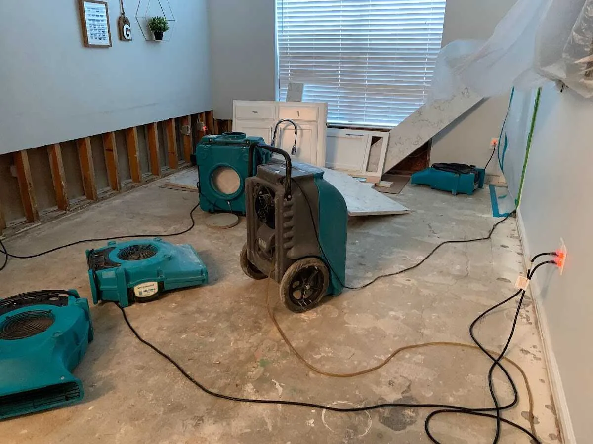 Dehumidifier in flood-cut room for Water Damage Restoration in Springtown